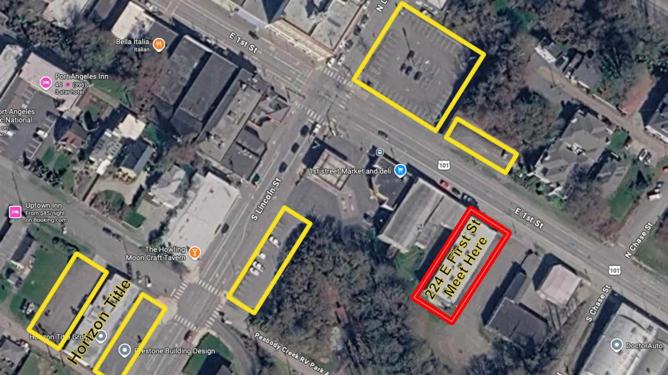 An annotated satellite map of a town. A red box highlights the meeting point at 224 E First St, and several yellow boxes show nearby parking lots.