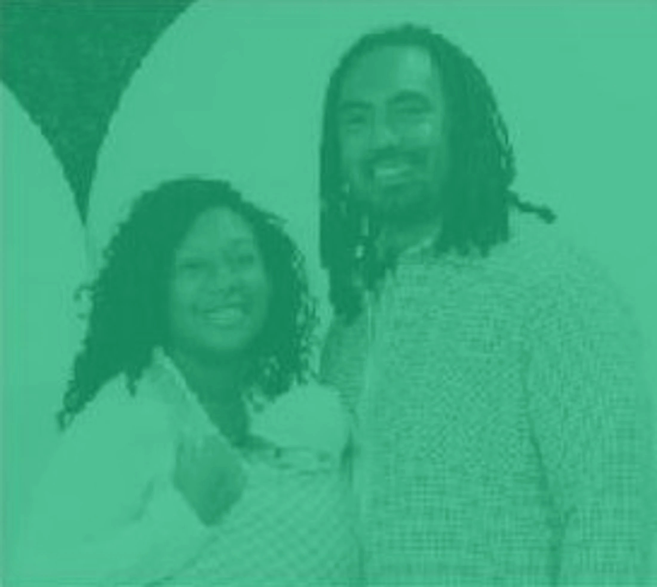 A smiling woman holding a baby in a sling stands next to a smiling man with long dreadlocks. The image has a green color overlay.