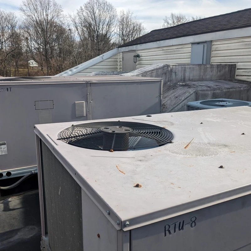<span class="OYPEnA text-decoration-none text-strikethrough-none">Five of the HVAC units are on the roof, requiring a crane.</span>