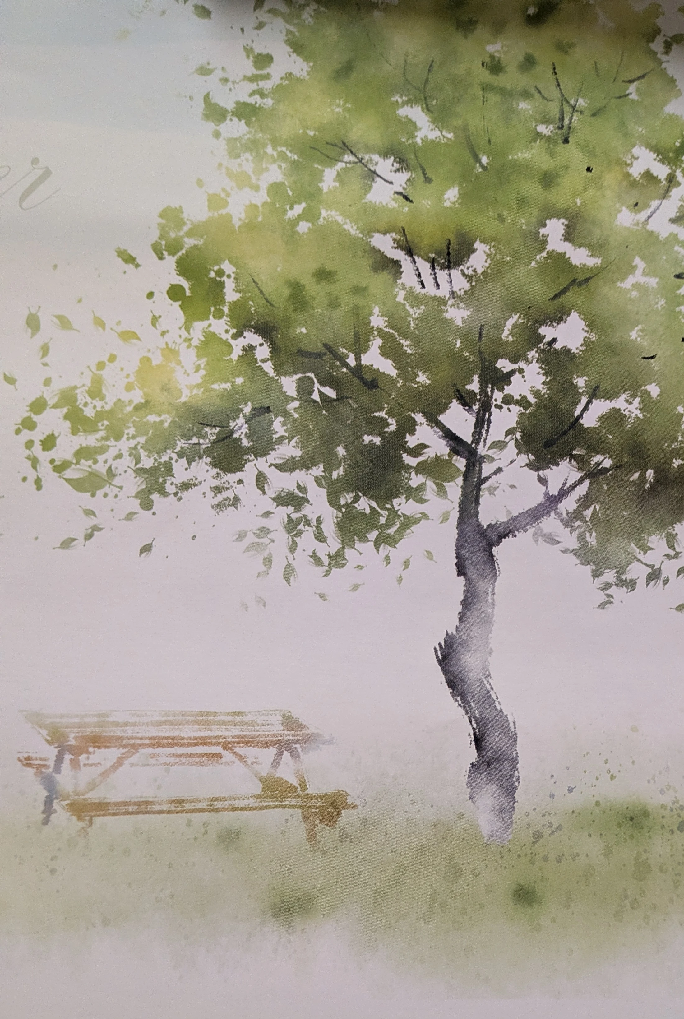 A watercolor painting of a large, leafy green tree standing next to a wooden picnic table on a grassy patch. The background is soft, misty, and light-colored.