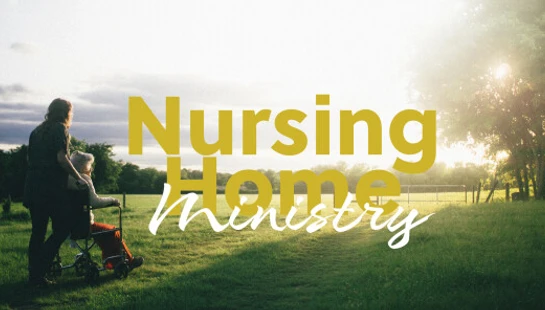 A caregiver pushes an elderly person in a wheelchair through a sunny, grassy field. The text on the image reads, 'Nursing Home Ministry'.
