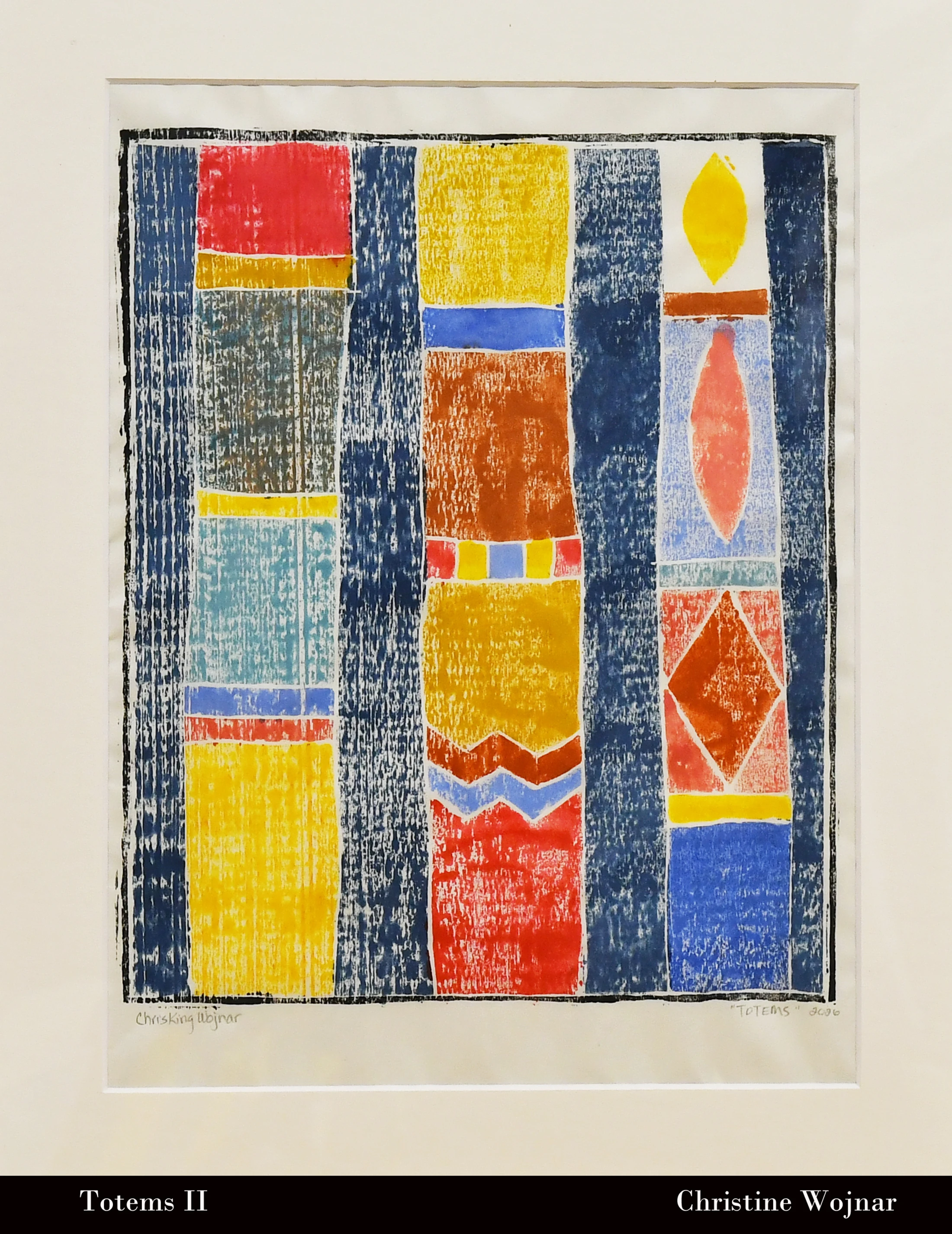 An abstract block print featuring three vertical, totem-like columns made of stacked colorful shapes against a textured, dark blue background.