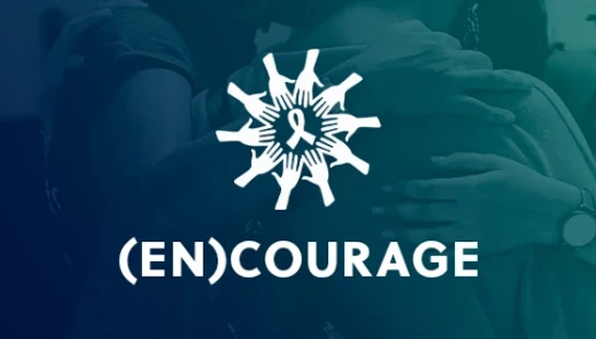 The (EN)COURAGE logo, a circle of hands around a ribbon, overlaid on a blue-tinted photo of two people embracing in a supportive hug.