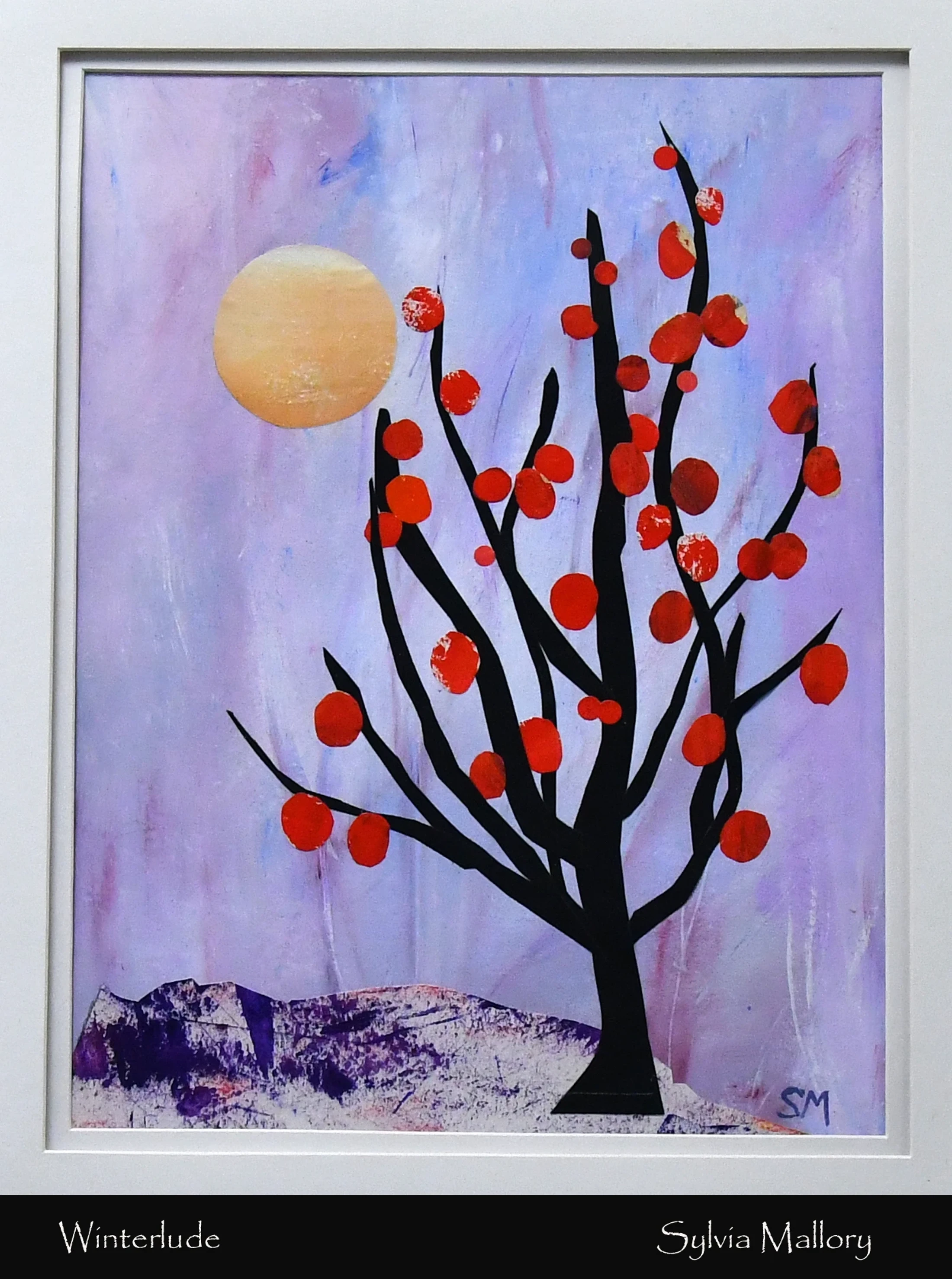 A framed mixed media collage showing a black tree silhouette with red berries against a purple sky with a yellow moon and a snowy mountain landscape.