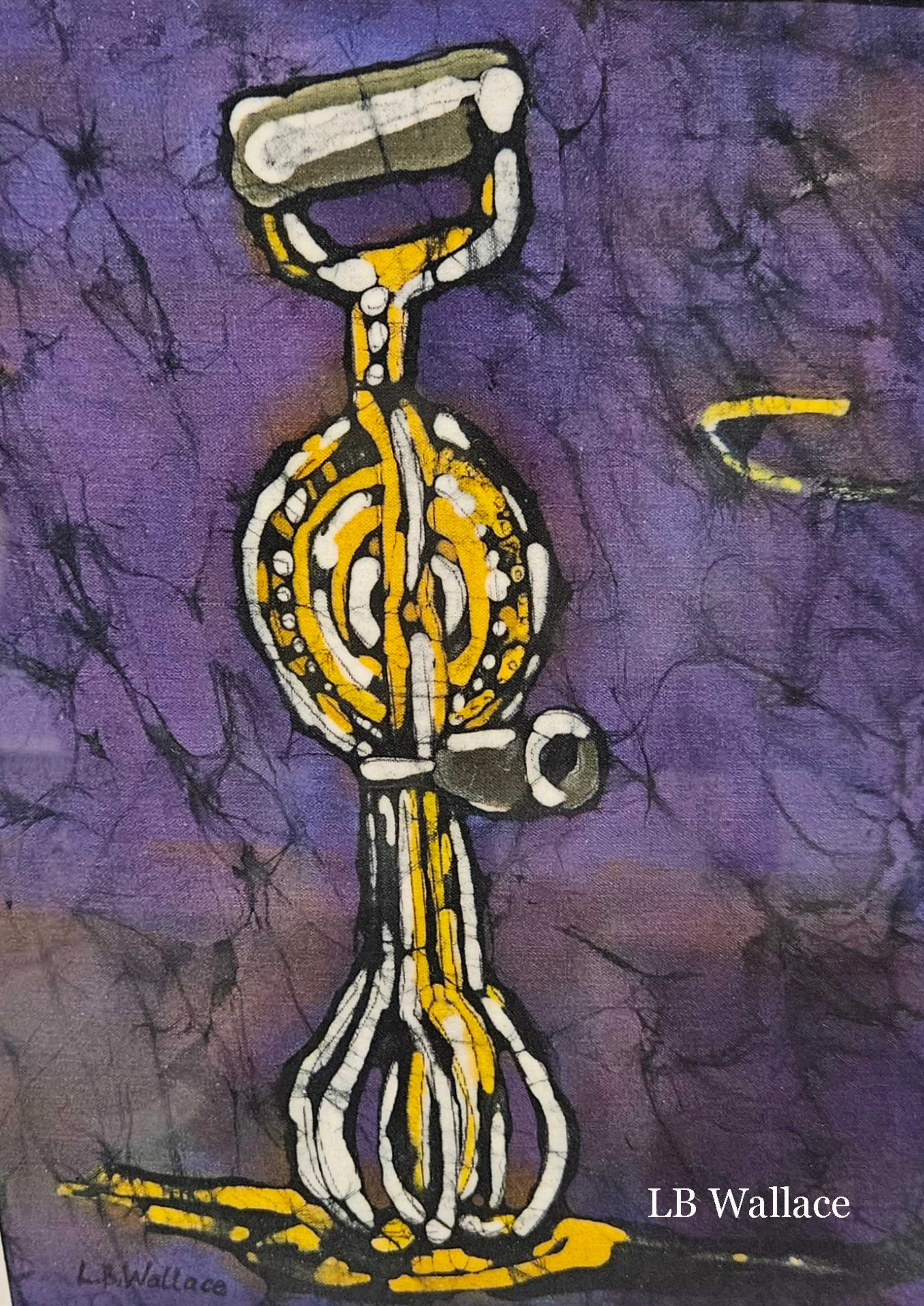 A batik painting of an abstract, totem-like figure in yellow, white, and black against a mottled purple background with black crackle lines.