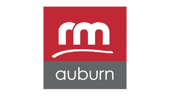 A square logo divided horizontally. The top red half has a white 'rm' monogram. The bottom grey half has the word 'auburn' in white lowercase letters.