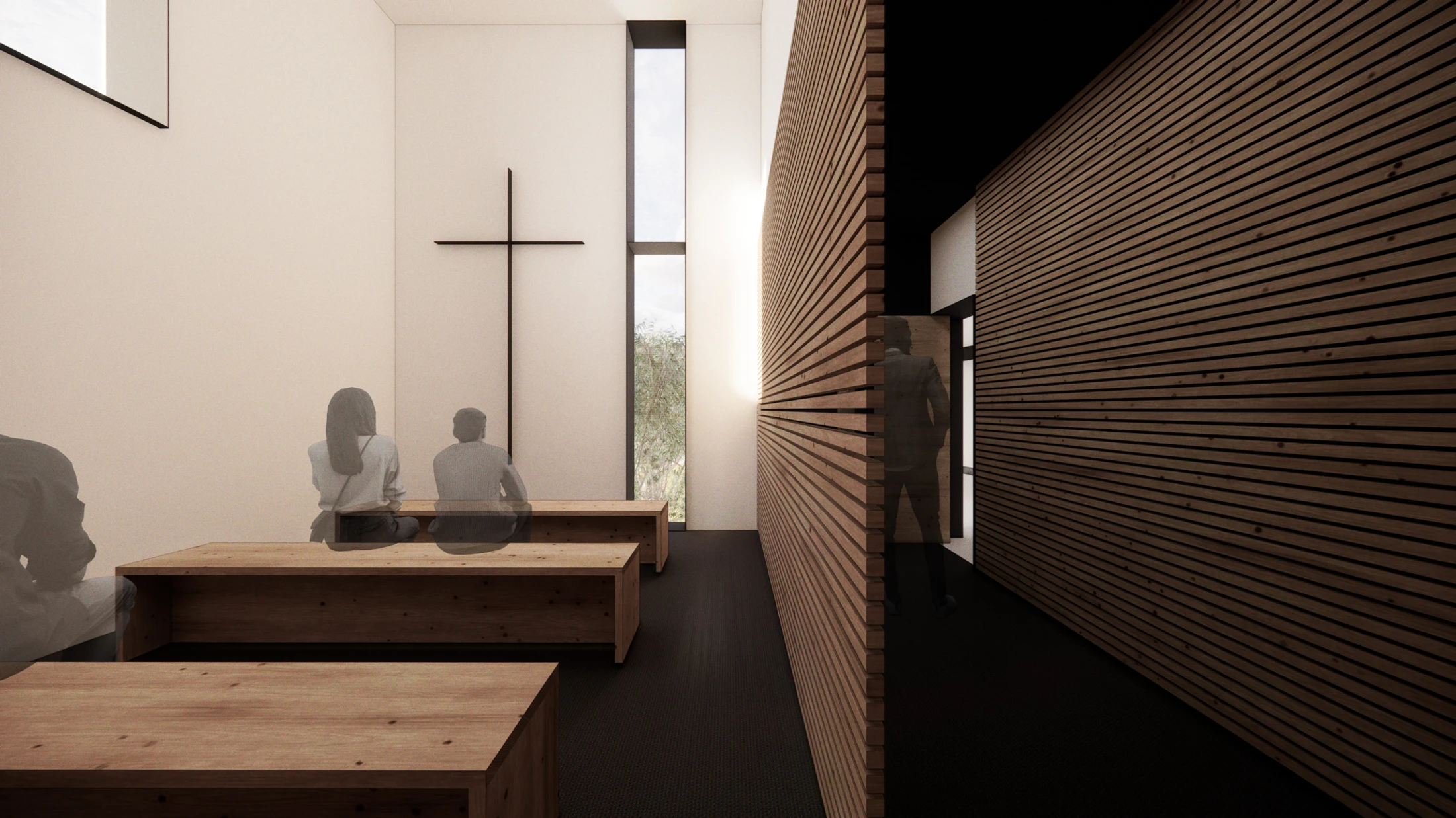 A minimalist chapel interior with white walls, wooden benches, and a slatted wood wall. A simple black cross hangs on the wall near a tall, narrow window.