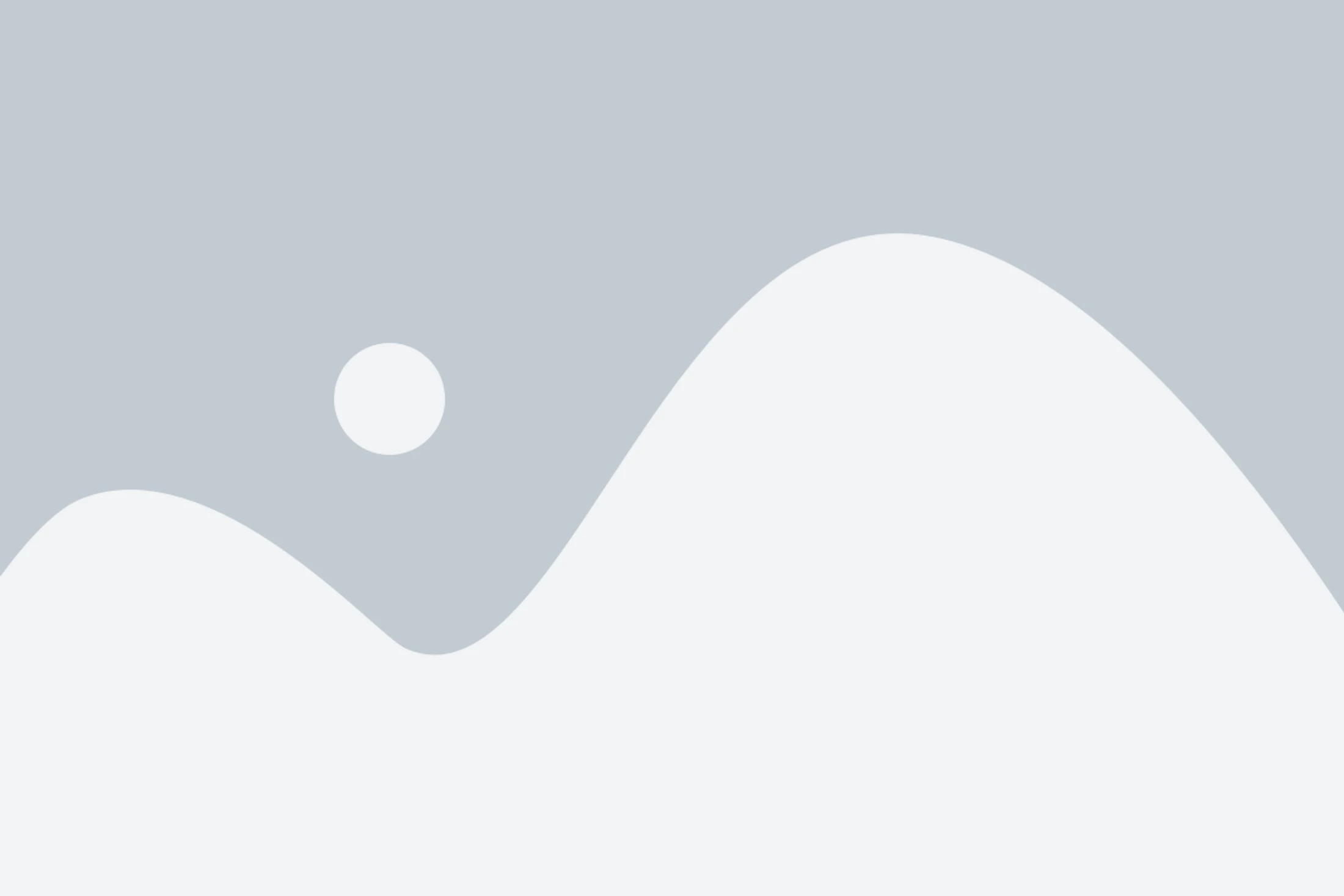 A gray placeholder image icon showing a stylized landscape with hills and a sun, used when an image is missing or cannot be displayed.