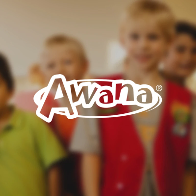 The Awana logo is in the foreground, with a soft-focus background image of a diverse group of young children smiling.