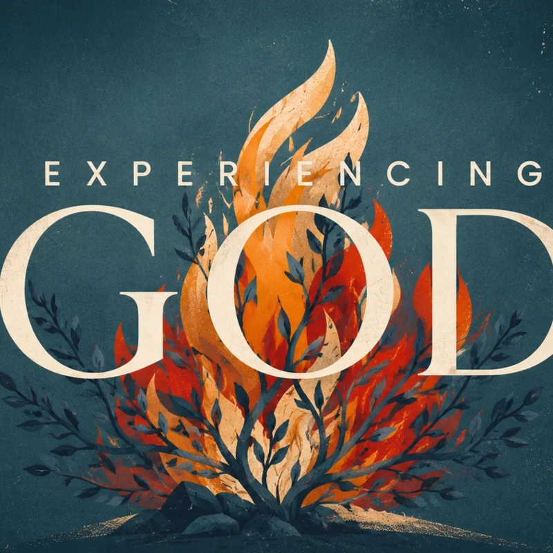 An illustration of a burning bush with orange and red flames. The text 'Experiencing GOD' is superimposed in white over the flames on a dark blue background.