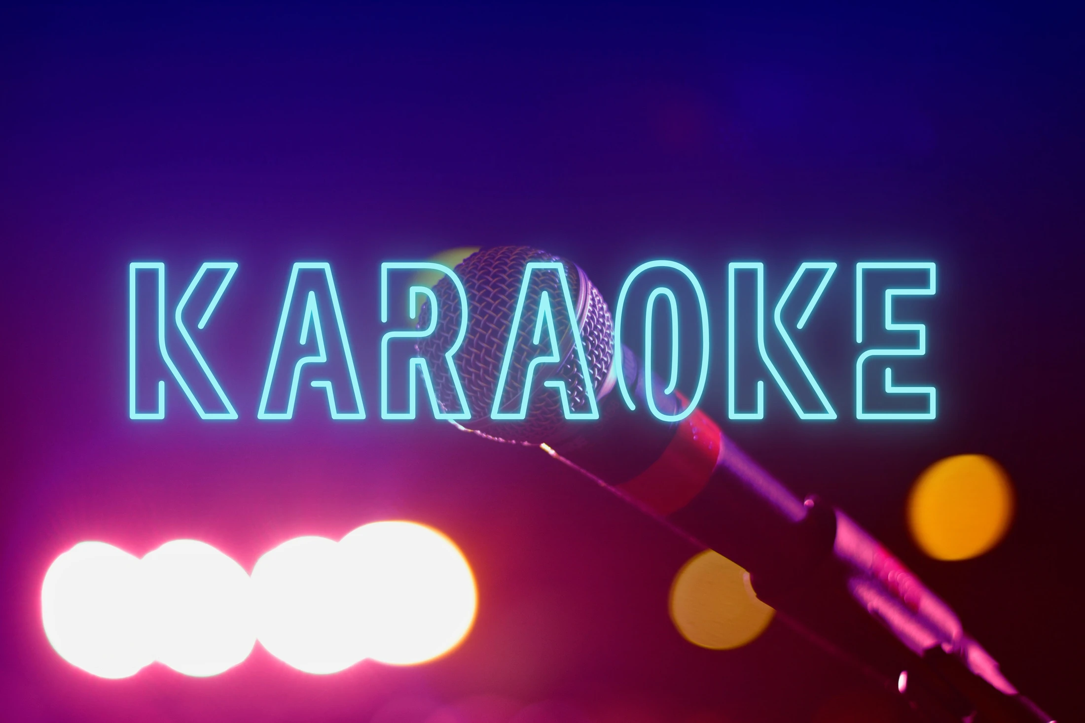 A microphone in the foreground with a glowing blue neon sign that reads KARAOKE behind it. The background is dark purple with out-of-focus stage lights.