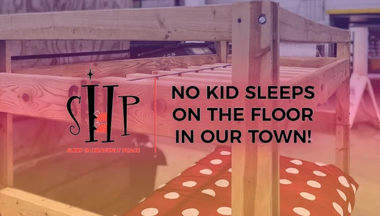 A wooden bunk bed with a red polka dot comforter. Text overlay reads 'SHP Sleep in Heavenly Peace' and 'No Kid Sleeps on the Floor in Our Town!'