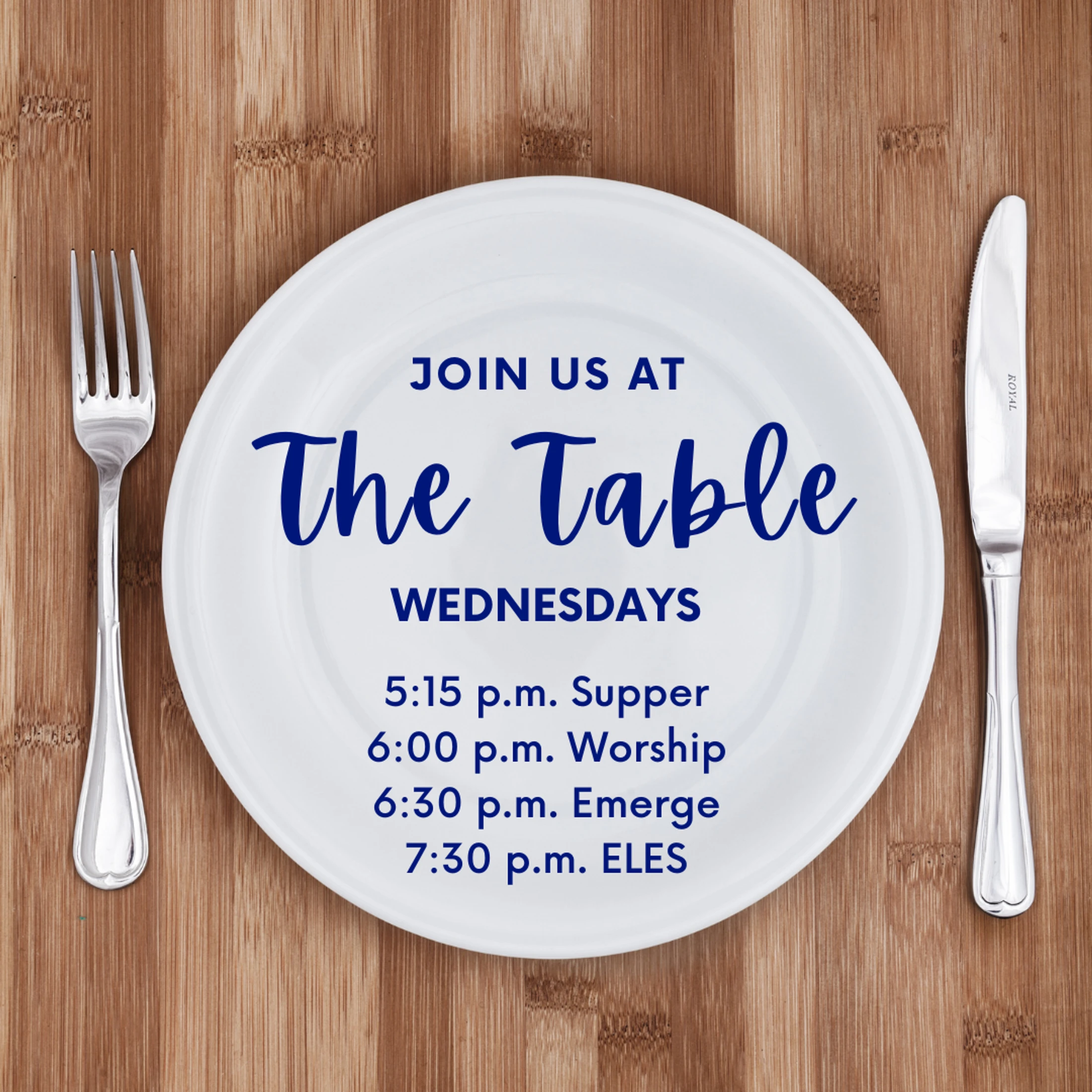 A white dinner plate on a wood table with a fork and knife. The plate reads: Join Us at The Table Wednesdays, followed by a schedule for supper and worship.