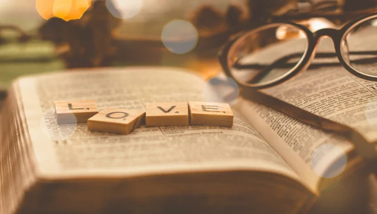 Love scrabble tiles on book page