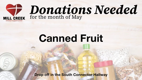 A graphic for Mill Creek Christian Support Center requesting donations of canned fruit for the month of May. The background shows various pantry food items.