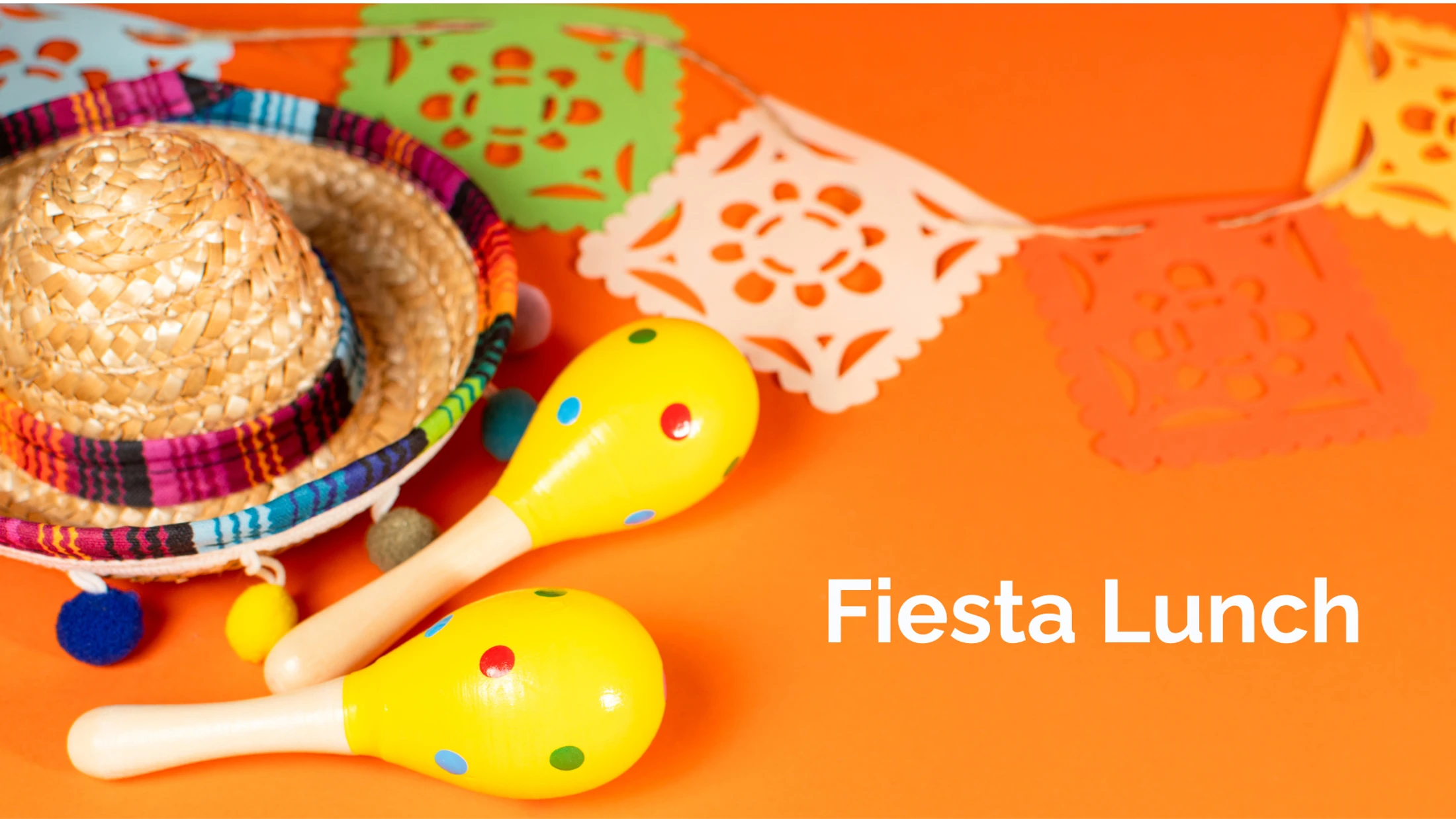 A small sombrero, two yellow maracas, and colorful paper banners on a bright orange background with the words 'Fiesta Lunch'.