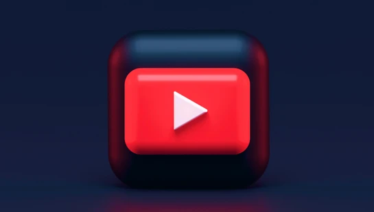 A 3D red play button icon on a dark blue background