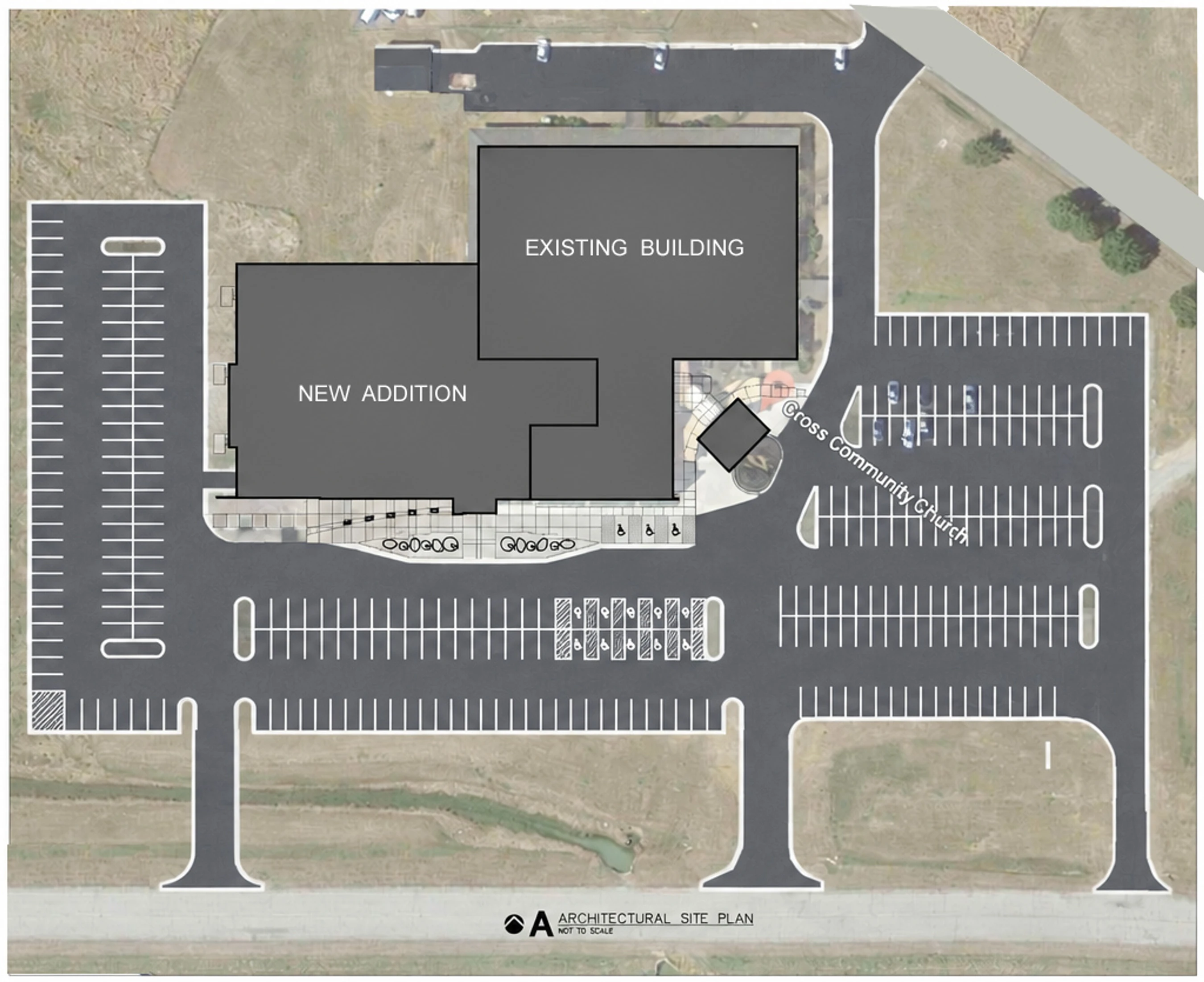 An aerial view architectural site plan showing a new addition and expanded parking lot for the existing Cross Community Church building.
