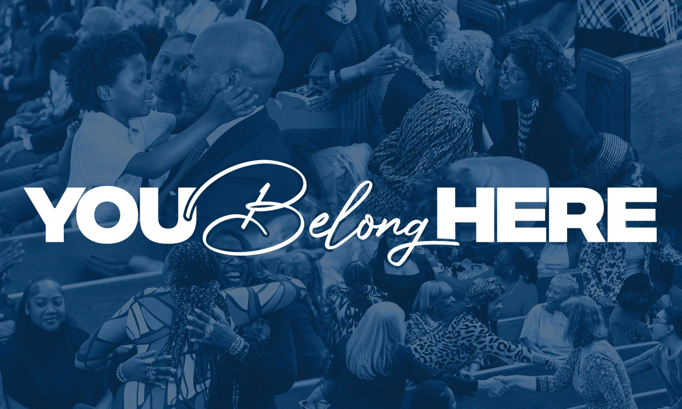 A blue-tinted collage of Black people hugging, smiling, and greeting each other in a community setting. White text in the center reads, 'YOU Belong HERE'.