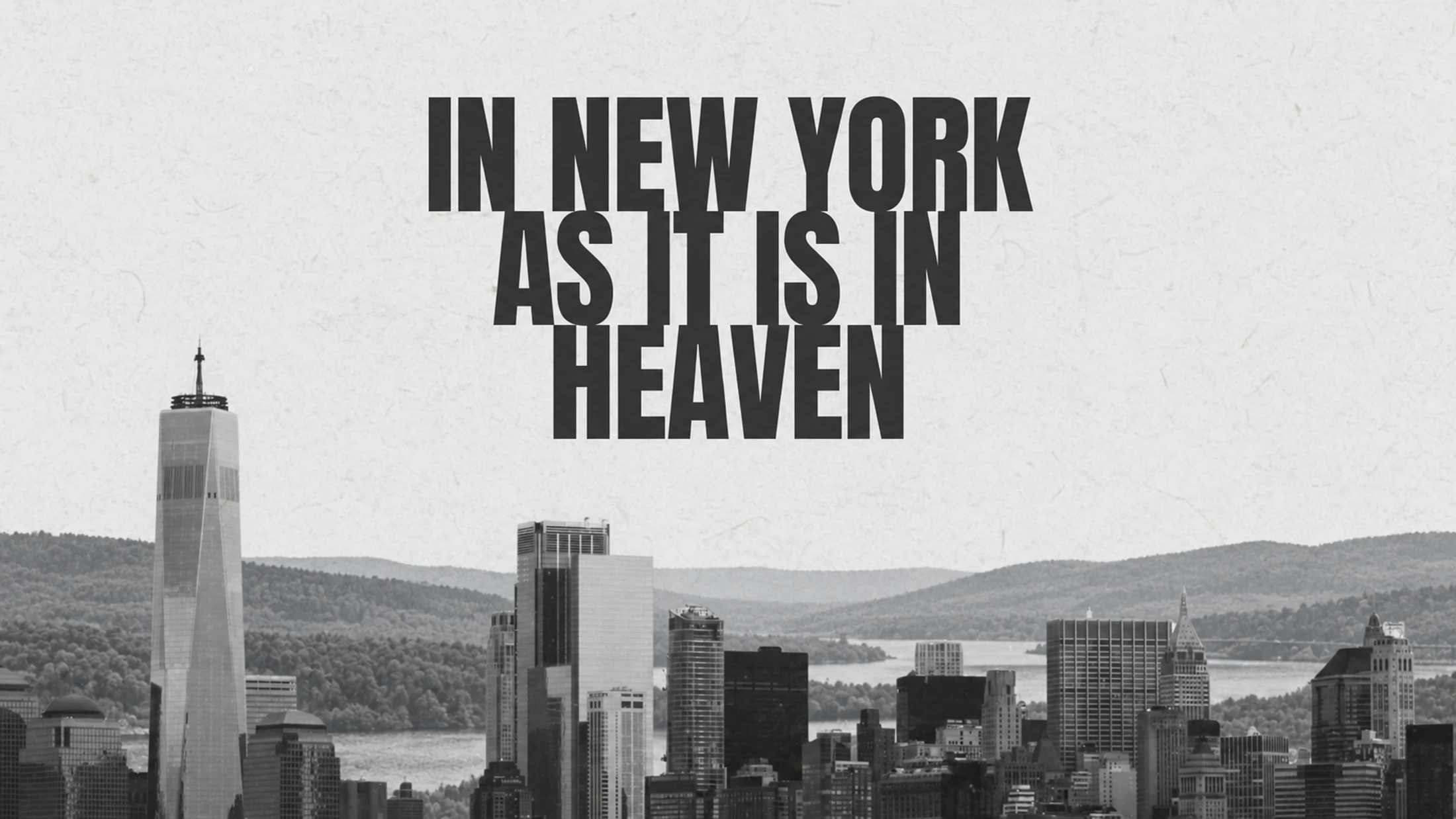 A black and white photo of the New York City skyline with text overlay reading, 'In New York As It Is In Heaven'.