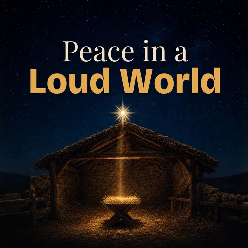 The text 'Peace in a Loud World' over a nativity scene. A bright star shines down on a glowing manger inside a stable under a starry night sky.