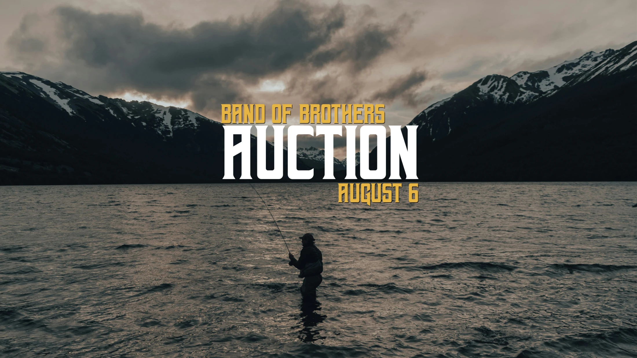 A graphic for the Band of Brothers Auction on August 6, showing a person fly fishing in a lake with mountains in the background under a cloudy sky.