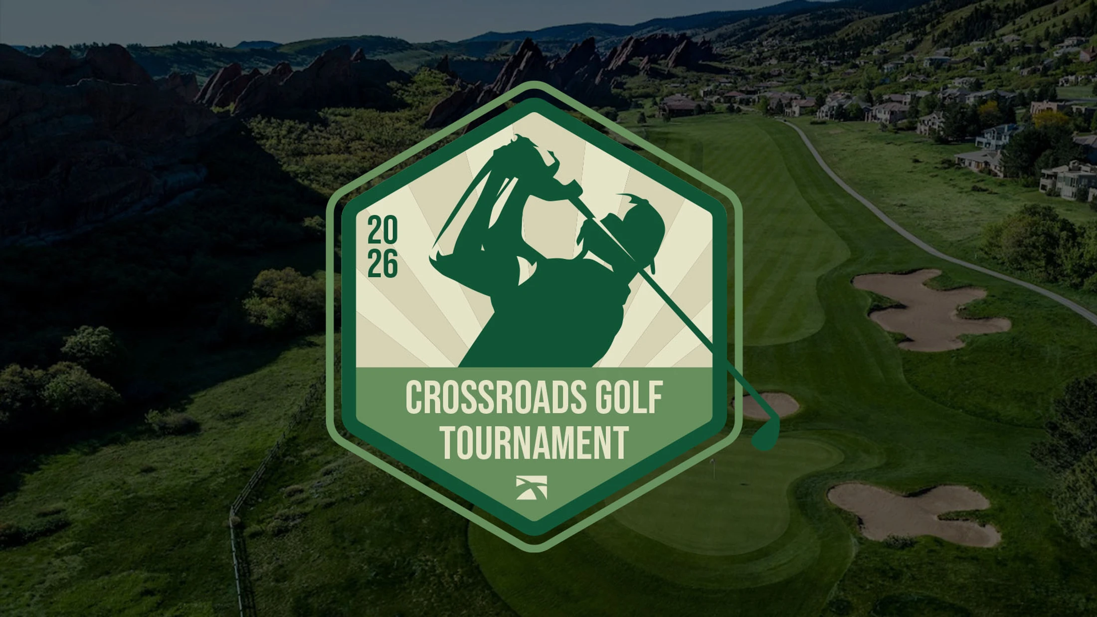 A green hexagonal logo for the 2026 Crossroads Golf Tournament, featuring a golfer swinging a club, set against an aerial view of a scenic golf course.
