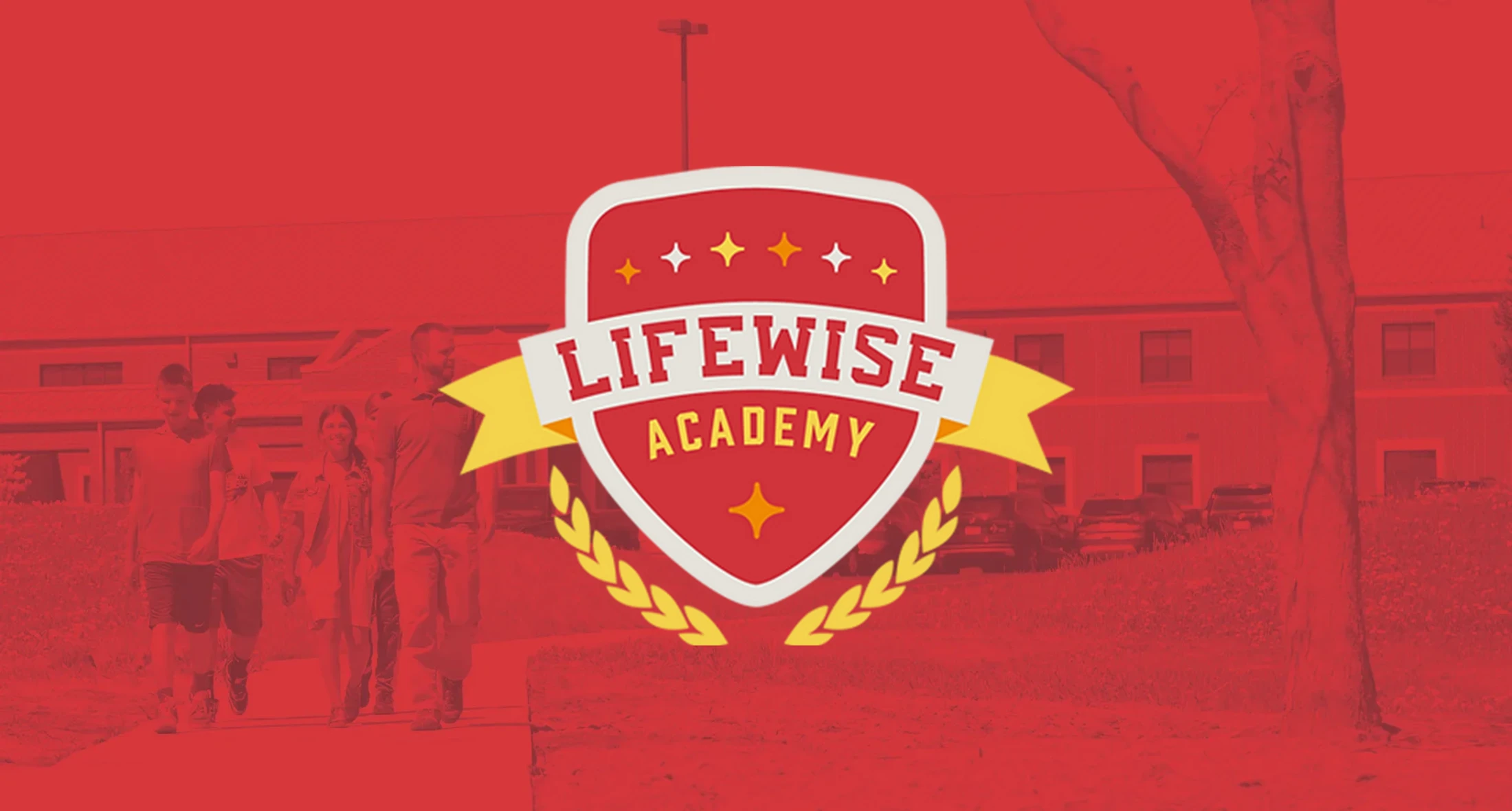 The Lifewise Academy shield logo is overlaid on a red-tinted photo of a group of students and an adult walking on a sidewalk outside a school building.