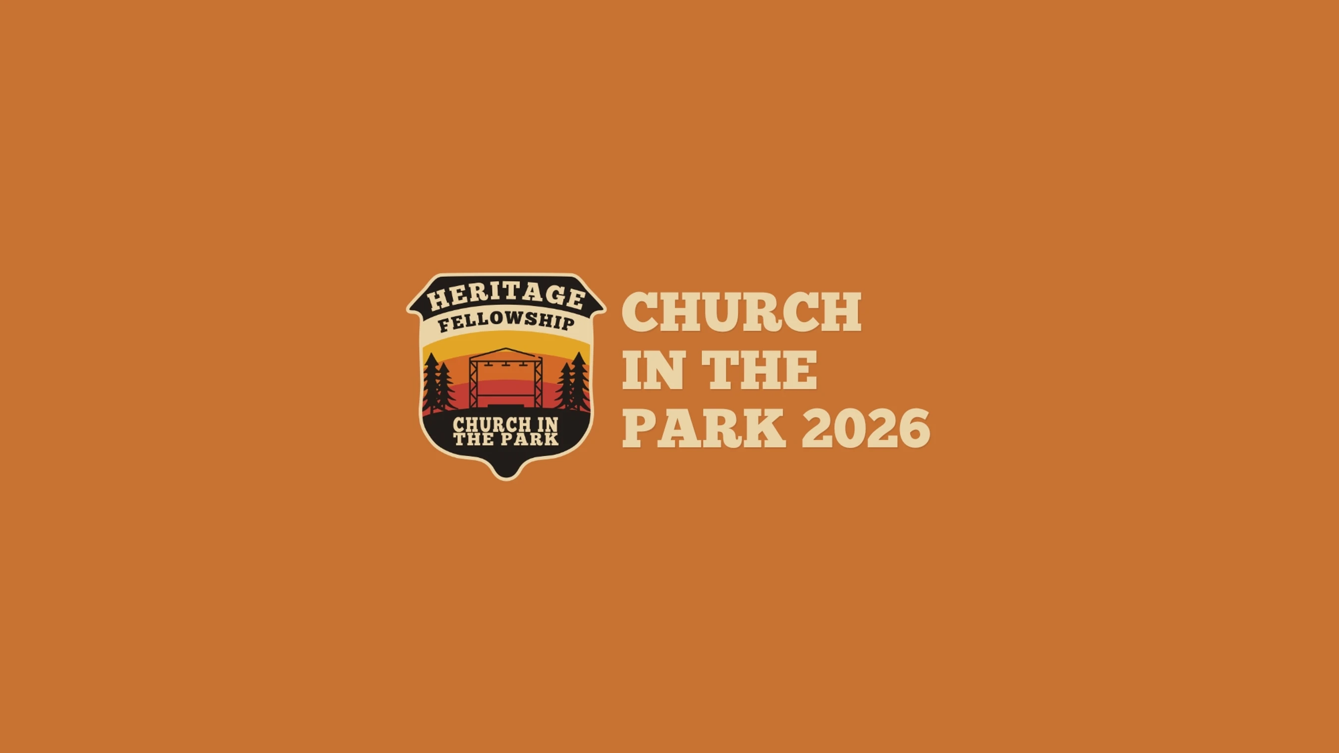 Logo for Heritage Fellowship's "Church in the Park 2026" event on a solid orange background. The logo shows an outdoor stage with trees.