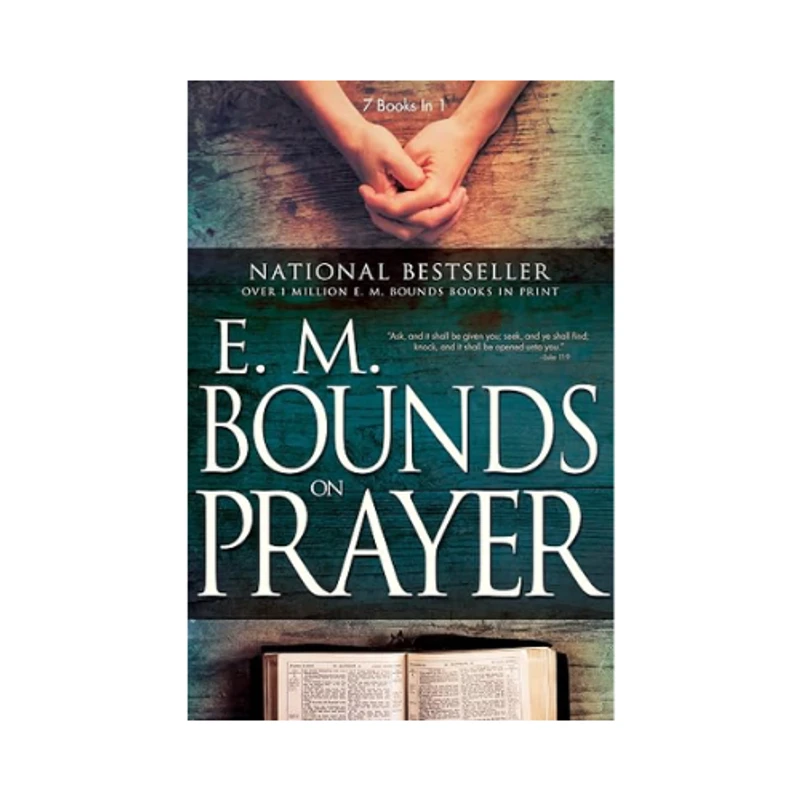 The cover of the book "E. M. Bounds on Prayer" featuring clasped hands at the top and an open Bible at the bottom against a rustic wood background.