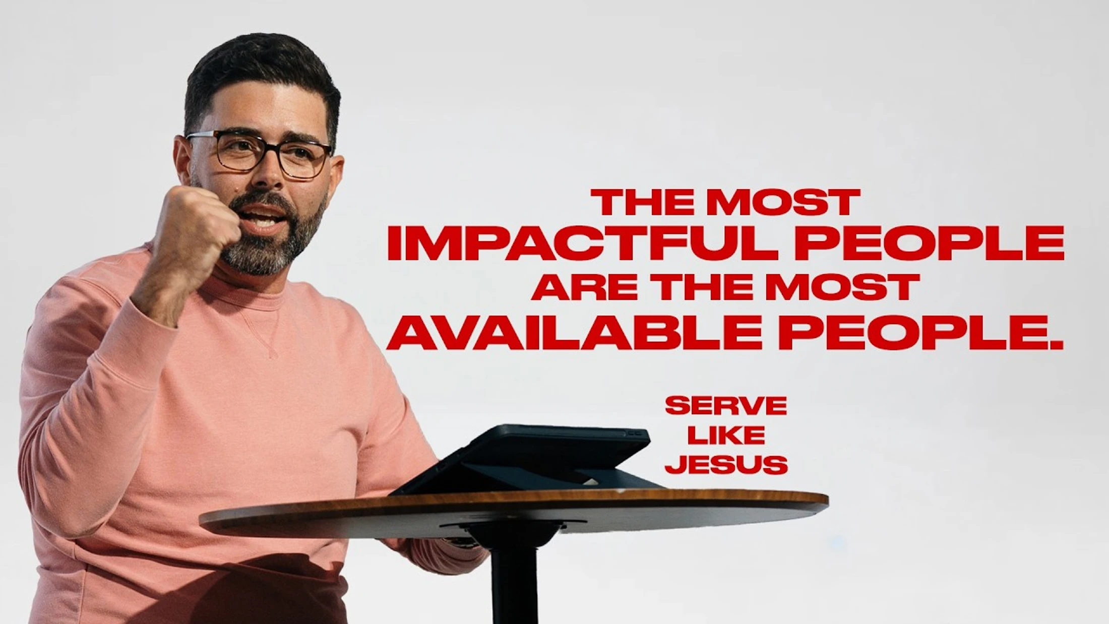 A man speaking passionately behind a lectern. Text reads: 'The most impactful people are the most available people. Serve like Jesus.'