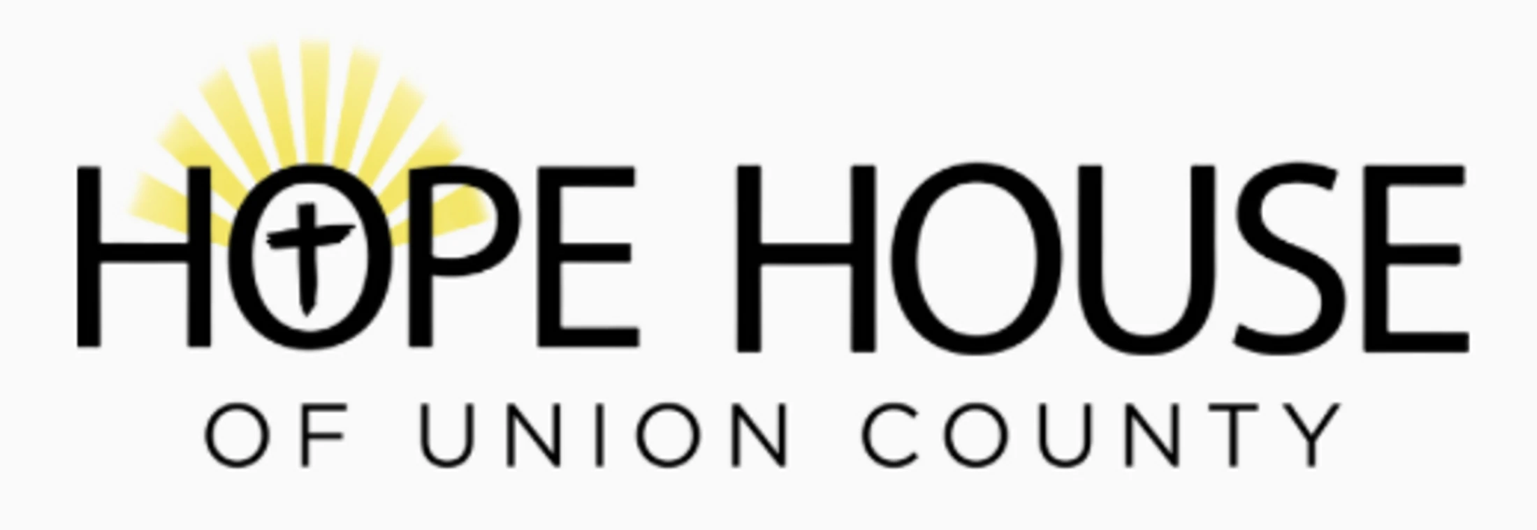 The logo for Hope House of Union County. The 'O' in 'Hope' contains a cross, with a yellow sunburst rising behind the first part of the word.