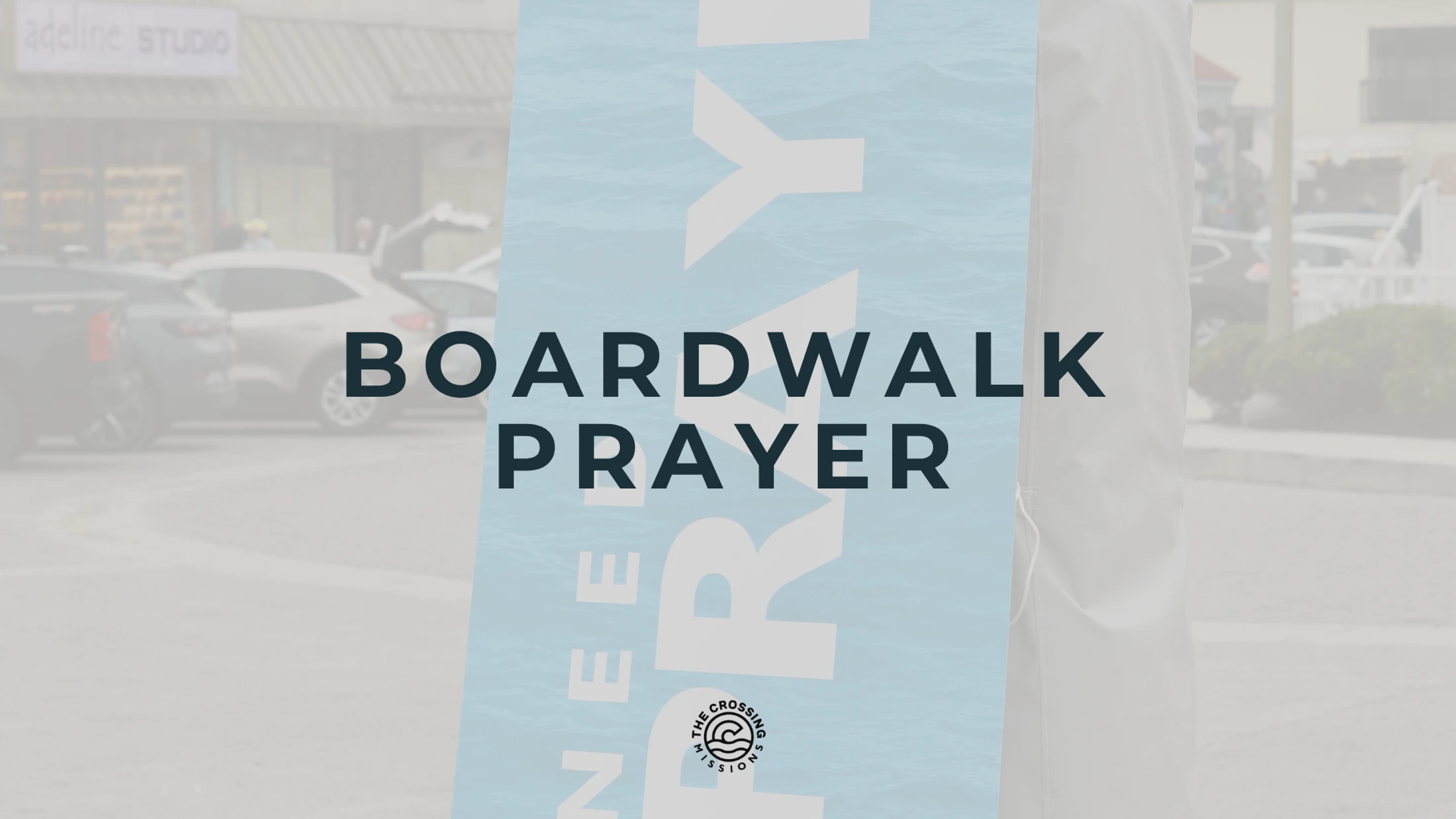 The Crossing Boardwalk Prayer banner displayed along the boardwalk in Rehoboth Beach.