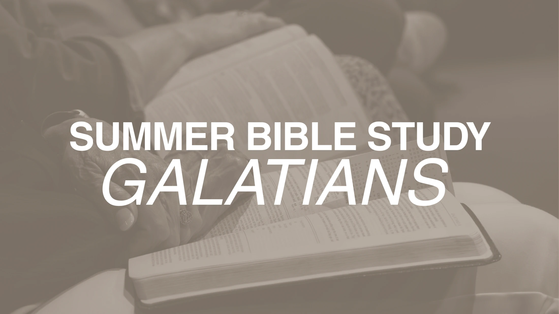 A person holds an open Bible. White text overlay reads 'Summer Bible Study Galatians'. The image has a warm brown monochrome filter.
