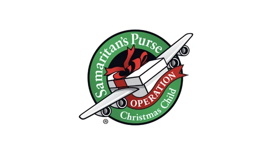 The logo for Samaritan's Purse Operation Christmas Child, featuring a shoebox gift with airplane wings flying through a green circular emblem.