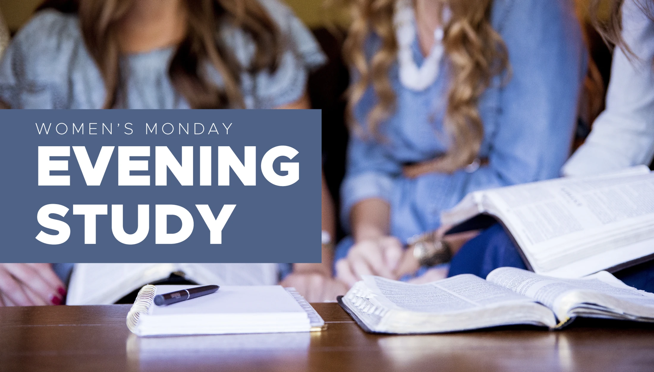 Women's Monday Evening Study — women with open Bibles and journals gathered around a table.