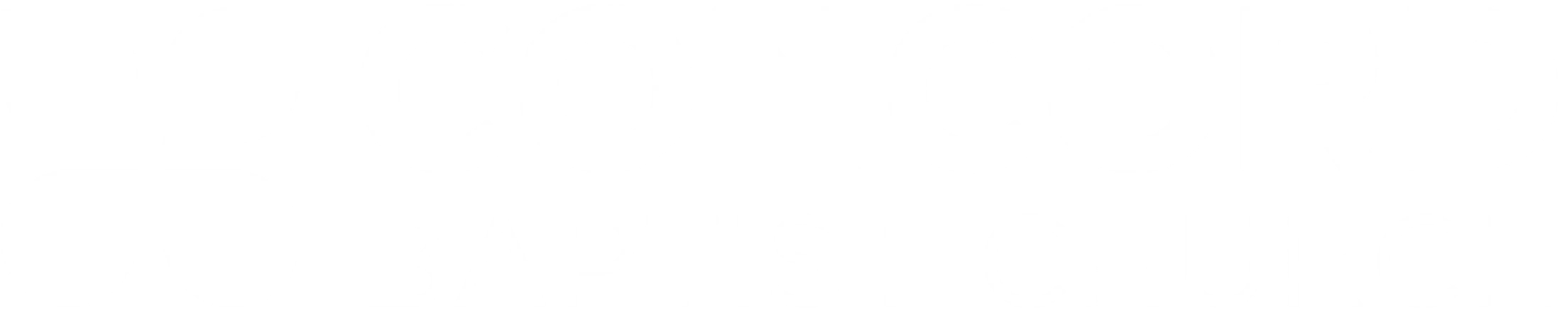 The white logo for Concord Baptist Church. It features a symbol made of four petal shapes next to the name of the church.