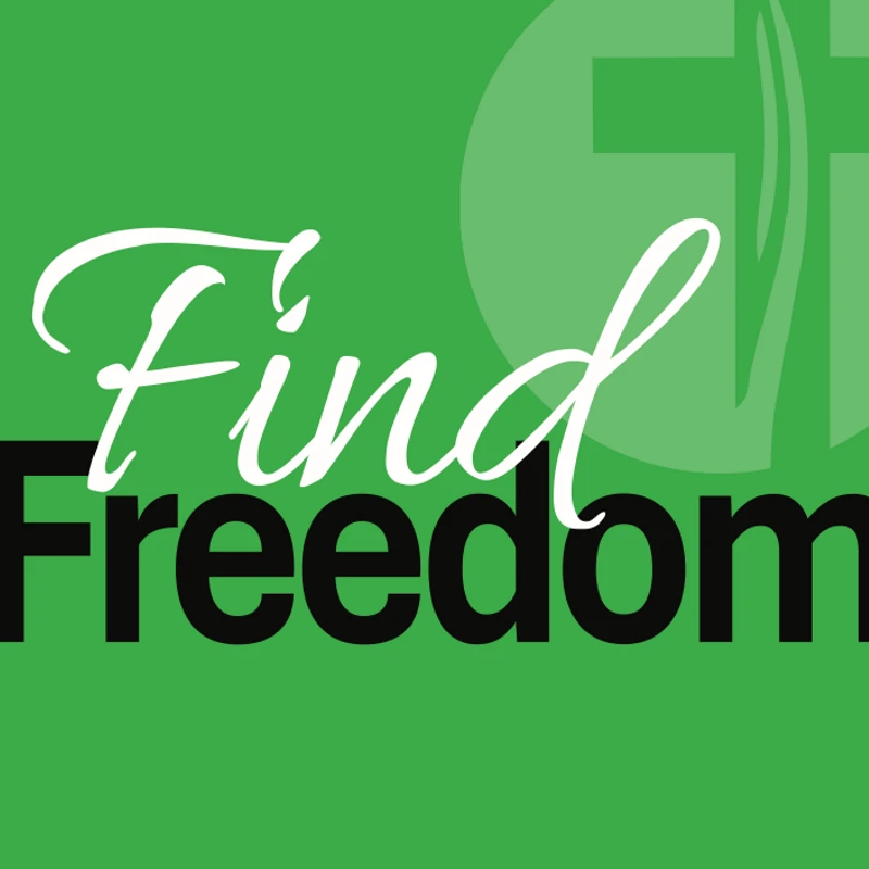 A green graphic with the words 'Find Freedom'. 'Find' is in white script and 'Freedom' is in black block letters. A faint cross is in the background.