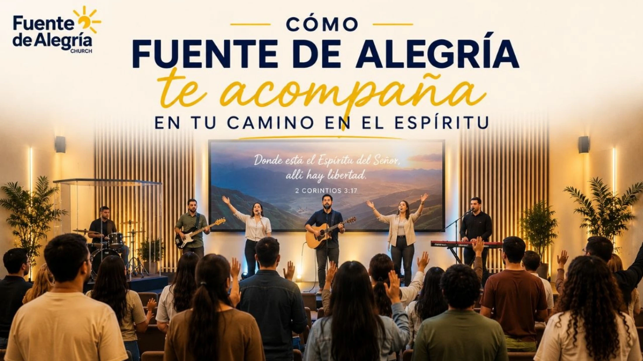 A band on stage leads a congregation in worship. The audience stands with hands raised. A Bible verse in Spanish is displayed on a screen in the background.