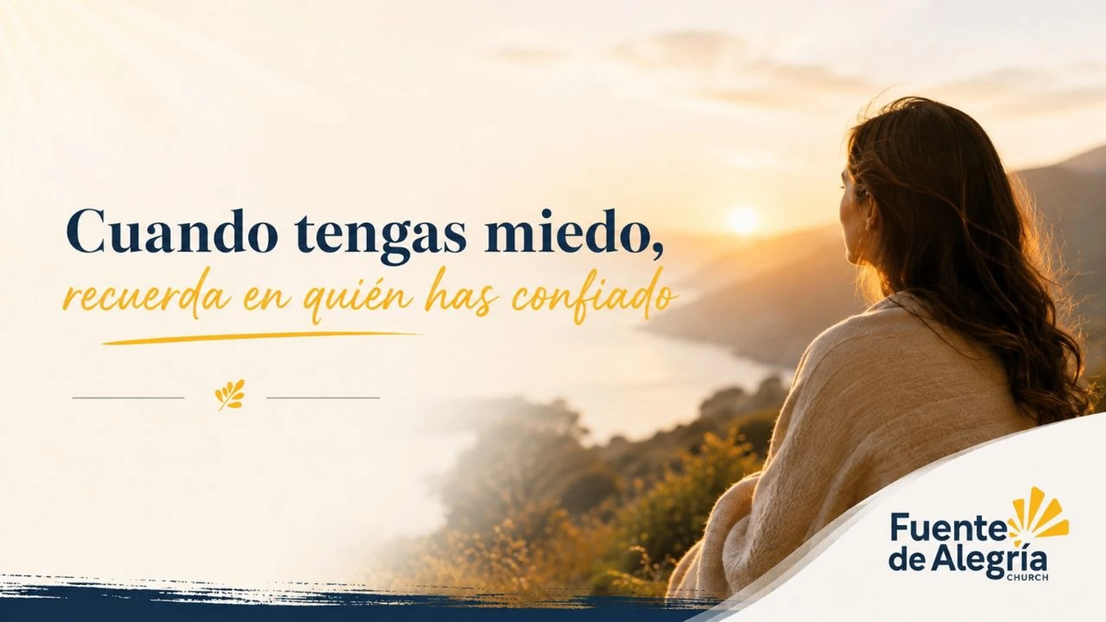 A woman looks out at a sunrise over mountains. Text in Spanish reads, "Cuando tengas miedo, recuerda en quién has confiado."