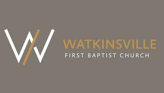 The logo for Watkinsville First Baptist Church, featuring a stylized 'W' next to the church's name on a solid taupe background.