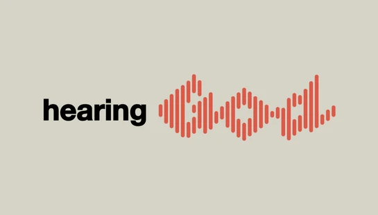 The phrase 'hearing God' where 'hearing' is in black text and 'God' is visualized as a red sound wave against a light gray background.