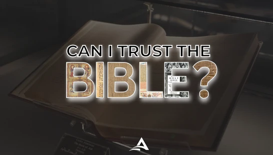 The question 'Can I trust the Bible?' is superimposed over a photo of an ancient, open book in a museum case. The letters contain historical text images.
