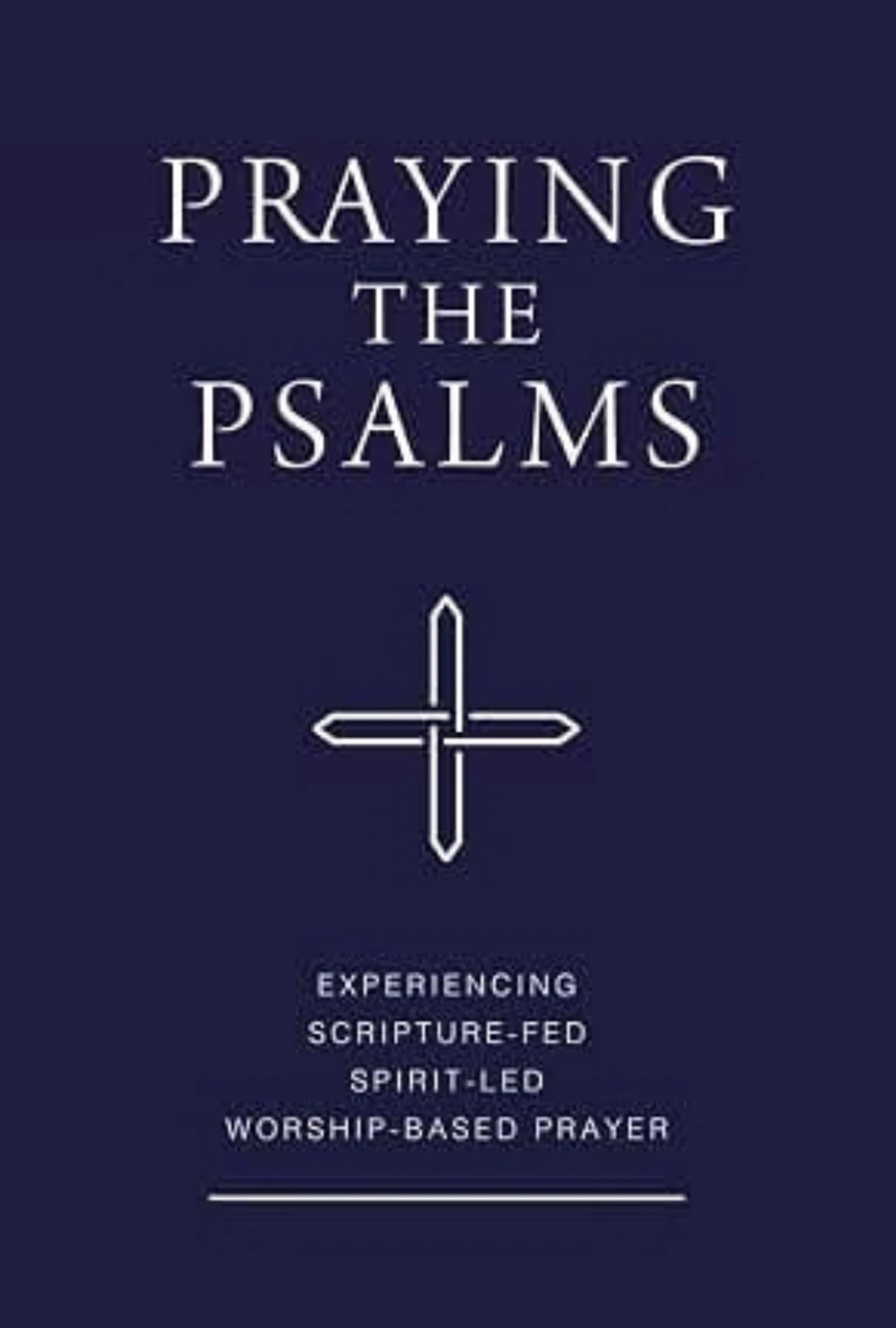 The dark blue cover of the book 'Praying the Psalms' featuring a white stylized cross and text about scripture-fed, spirit-led, worship-based prayer.