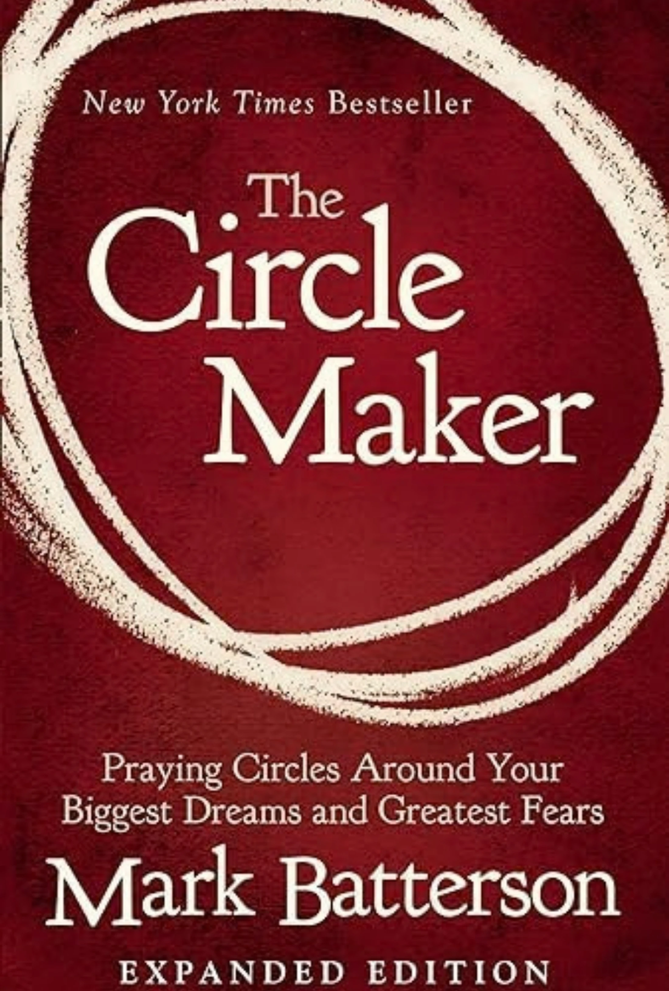 The book cover for 'The Circle Maker' by Mark Batterson. The title is in white font on a textured red background, enclosed by a rough, white hand-drawn circle.