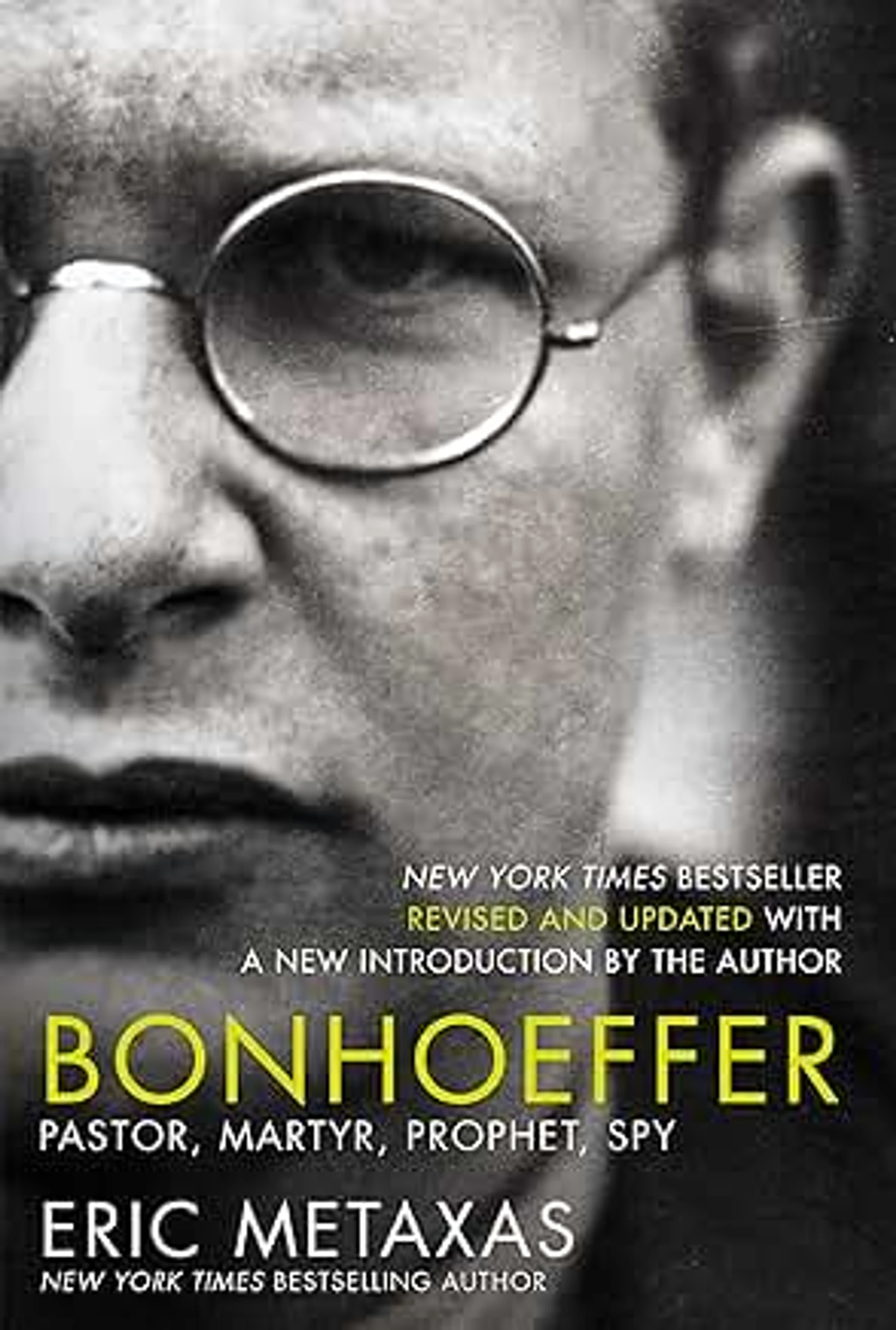 The book cover for "Bonhoeffer" by Eric Metaxas, showing a black-and-white close-up photo of a man with round glasses and a serious expression.