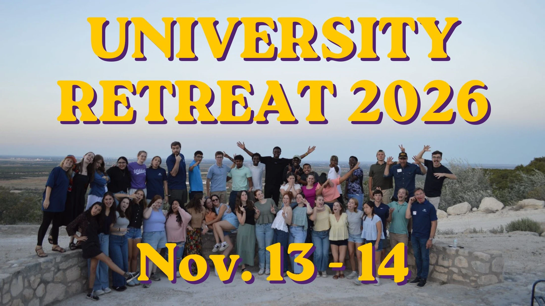A large, diverse group of university students posing for a fun photo outdoors at dusk, with text overlay reading 'University Retreat 2026, Nov. 13-14'.