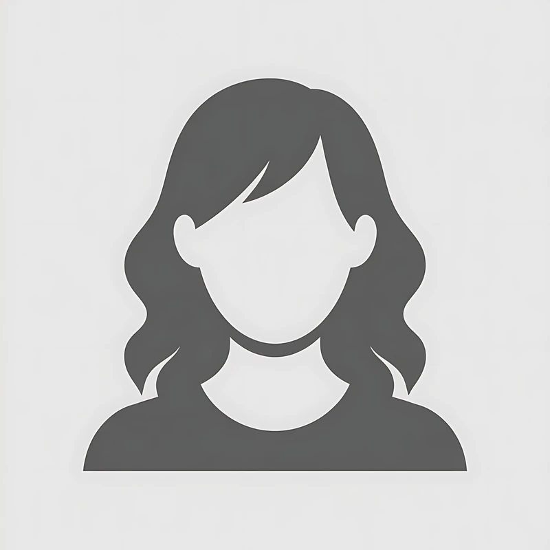 A simple, grey silhouette icon of a woman with shoulder-length wavy hair. Her face is blank, representing a generic user avatar.